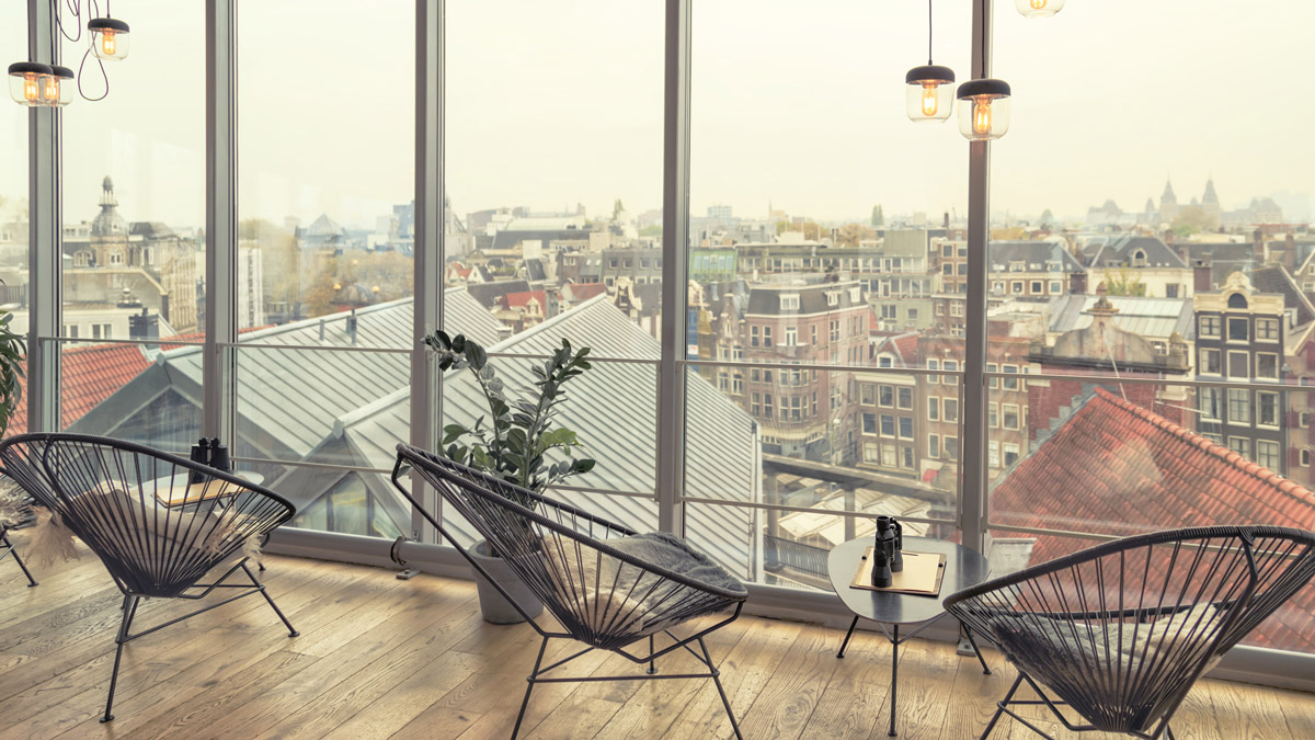 Cozy cafe with view of Amsterdam city