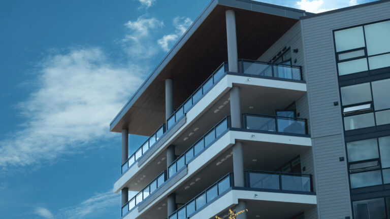 A contemporary condo with glass windows