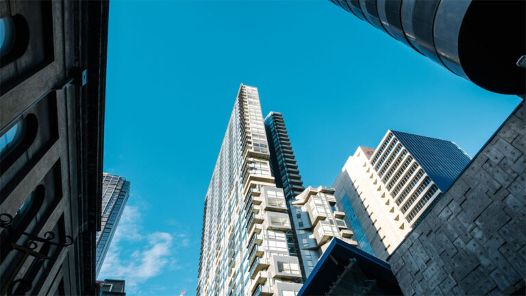 Modern high building towering against the city skyline