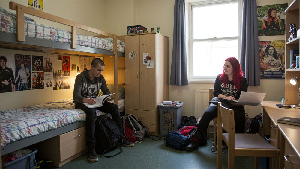 Students relaxing in shared dormitory space